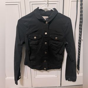 Black denim jacket, brand Tinsel Town, size medium. Never worn before.